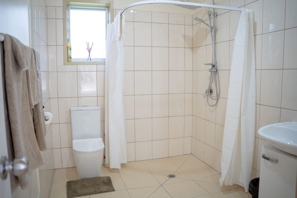 Bathroom with walk-in rain shower