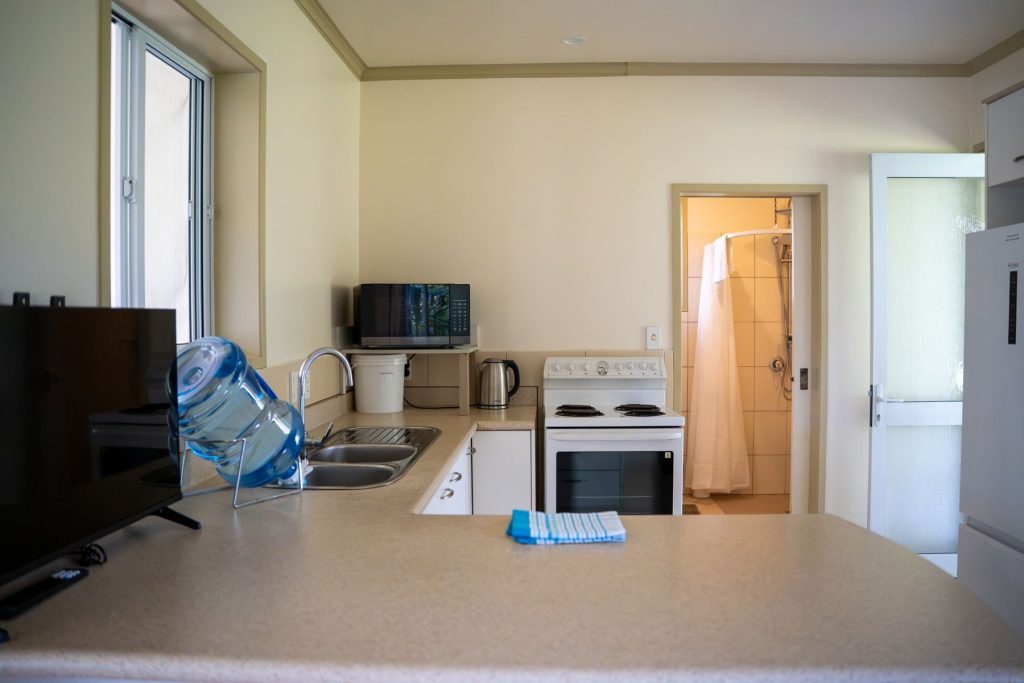 Kitchen with oven, microwave and filtered water